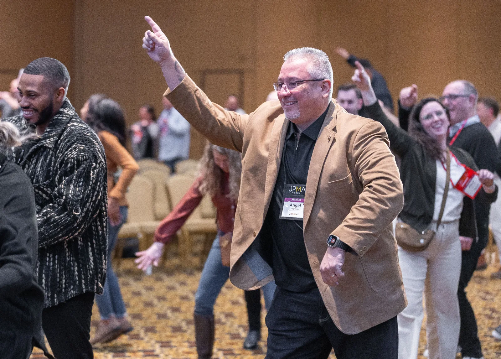 The Party Scientist activating a room full of dancing, laughing attendees at a conference