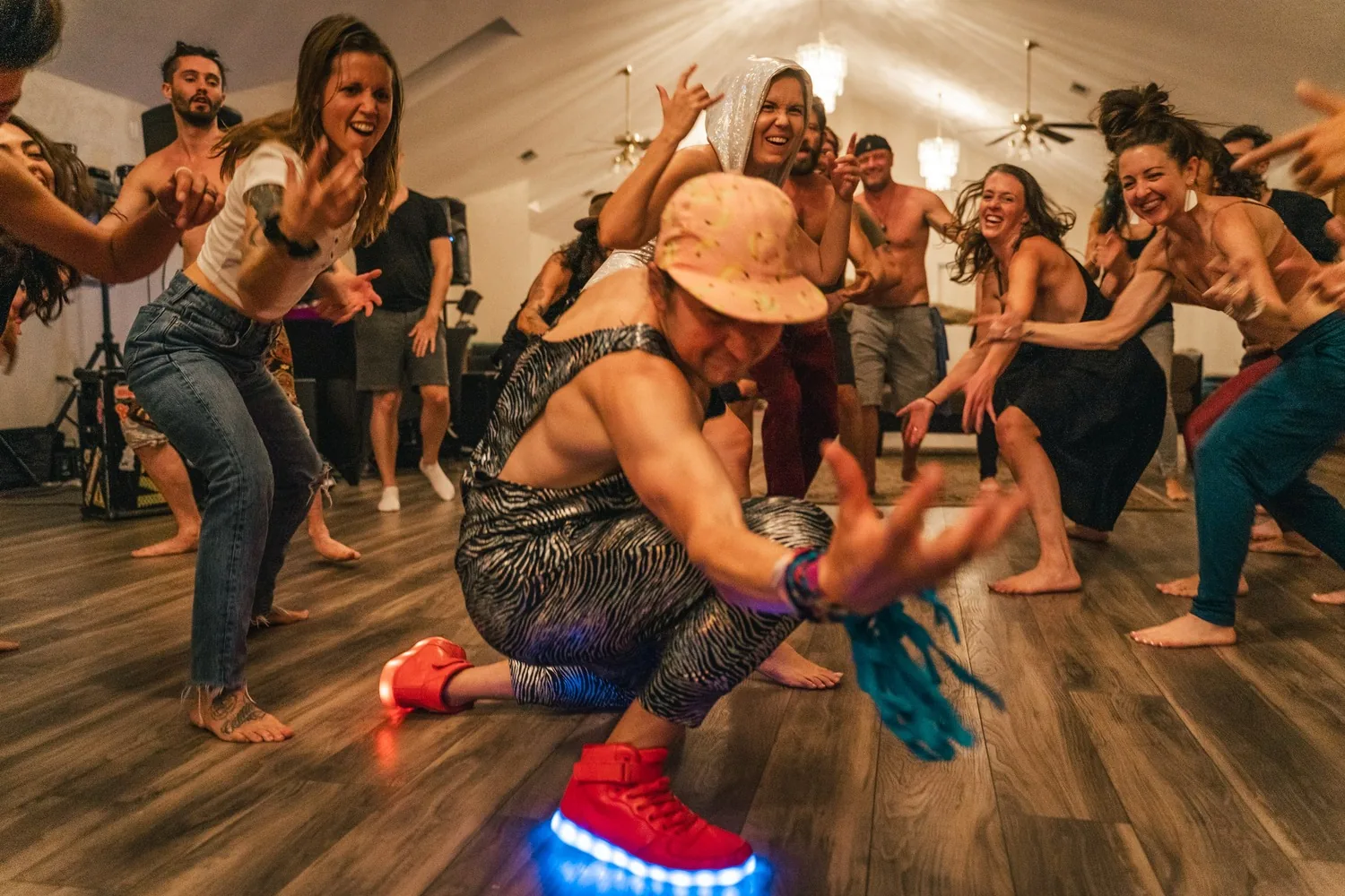 A room of fun leaders erupting in a synchronized dance moment