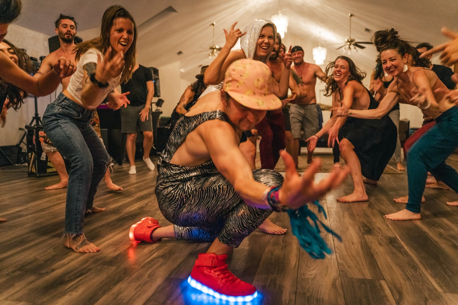 A room of fun leaders erupting in a synchronized dance moment