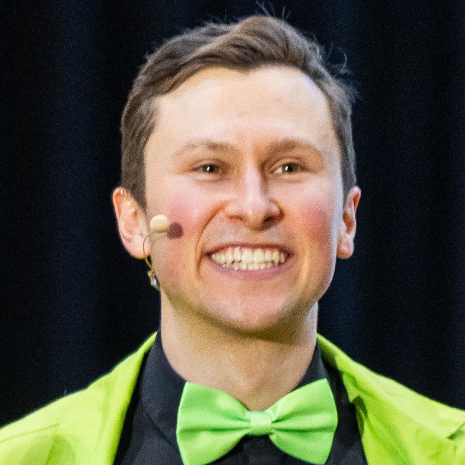 Jacques holding the Vanguard Award - Distinction, Live It Up Awards Vancouver 2025